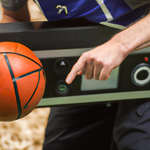 Vận động viên bóng rổ điều chỉnh cài đặt máy bắn bóng rổ